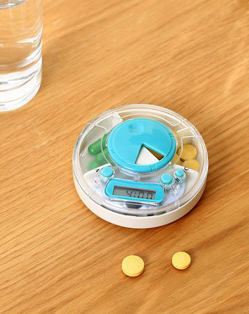 Lille tablet box med alarm indstillinger